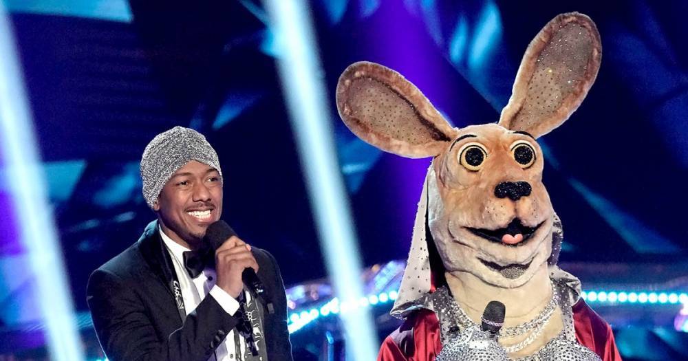 ‘The Masked Singer’ Recap: Super 9 Perform and the White Tiger Is Revealed - www.usmagazine.com