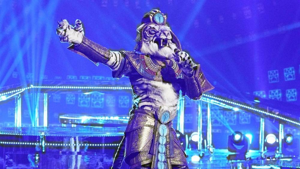 'The Masked Singer': The White Tiger Gets Mauled in Week 10 -- See What Sports Superstar Was Under the Mask - www.etonline.com