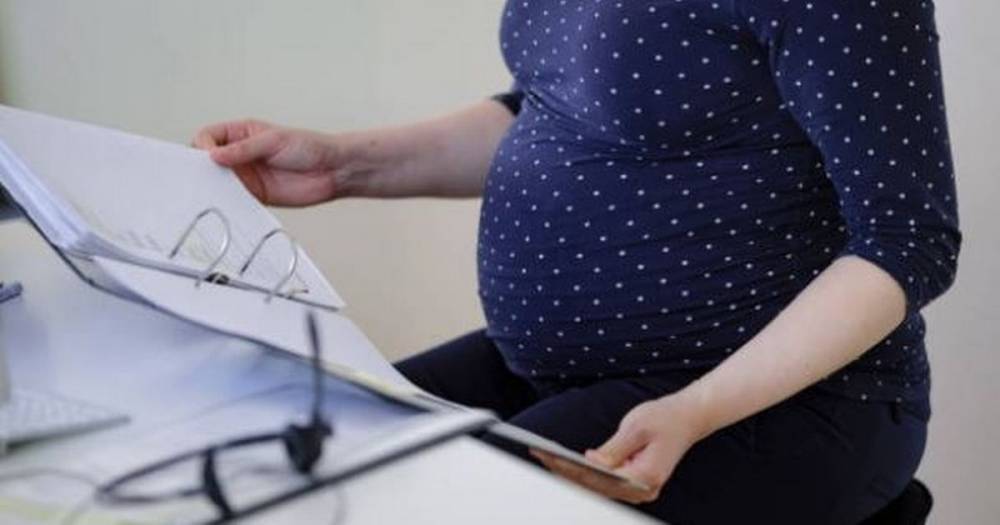 Pregnant woman sacked by law firm after taking two days off with severe morning sickness wins £23k payout - www.manchestereveningnews.co.uk - Manchester
