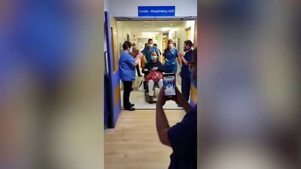 Touching moment amazing Wigan NHS staff applaud recovering coronavirus patient as he leaves hospital - www.manchestereveningnews.co.uk