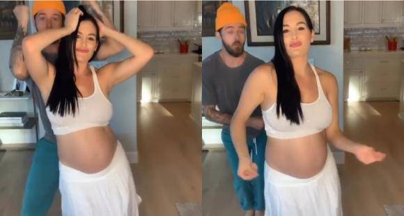 Nikki Bella flaunts her baby bump in the Savage Challenge with fiance Artem Chigvintsev; Watch Video - www.pinkvilla.com