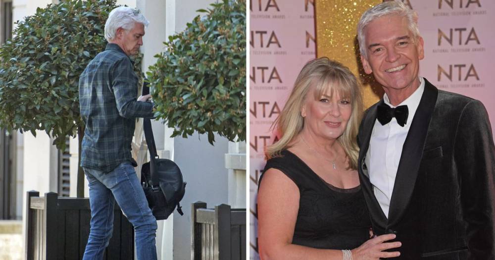 Phillip Schofield pictured arriving at new London flat as he moves out of family home after coming out as gay - www.ok.co.uk - county New London