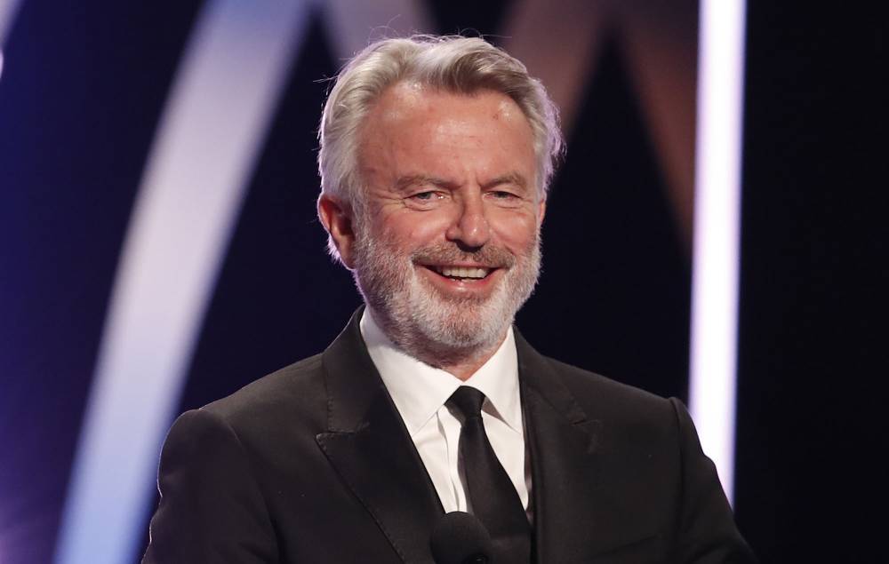 Sam Neill performs ukulele cover of ‘Uptown Funk’ from self-isolation - www.nme.com - New Zealand