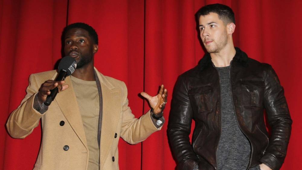Watch Kevin Hart and Nick Jonas Run Off When Asked to Hold a Huge Snake - www.etonline.com