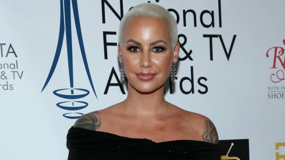Amber Rose Totally Transforms With New Long Hair Look, Shows Off Face Tattoos: Pics - www.etonline.com - Malibu