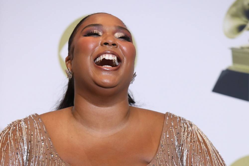 Lizzo Song Removed From ‘Rock Band’ Video Game Due To Racial Slur - etcanada.com