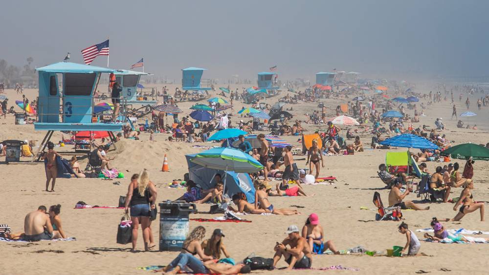 Thousands Pack Southern California Beaches Amid Coronavirus Pandemic - www.hollywoodreporter.com - California
