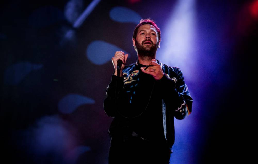 Kasabian’s Tom Meighan pays tribute to NHS with two new acoustic covers - www.nme.com