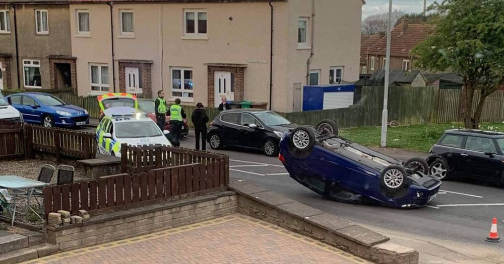 Car flips onto roof in Scots estate after early morning horror smash - www.dailyrecord.co.uk - Scotland