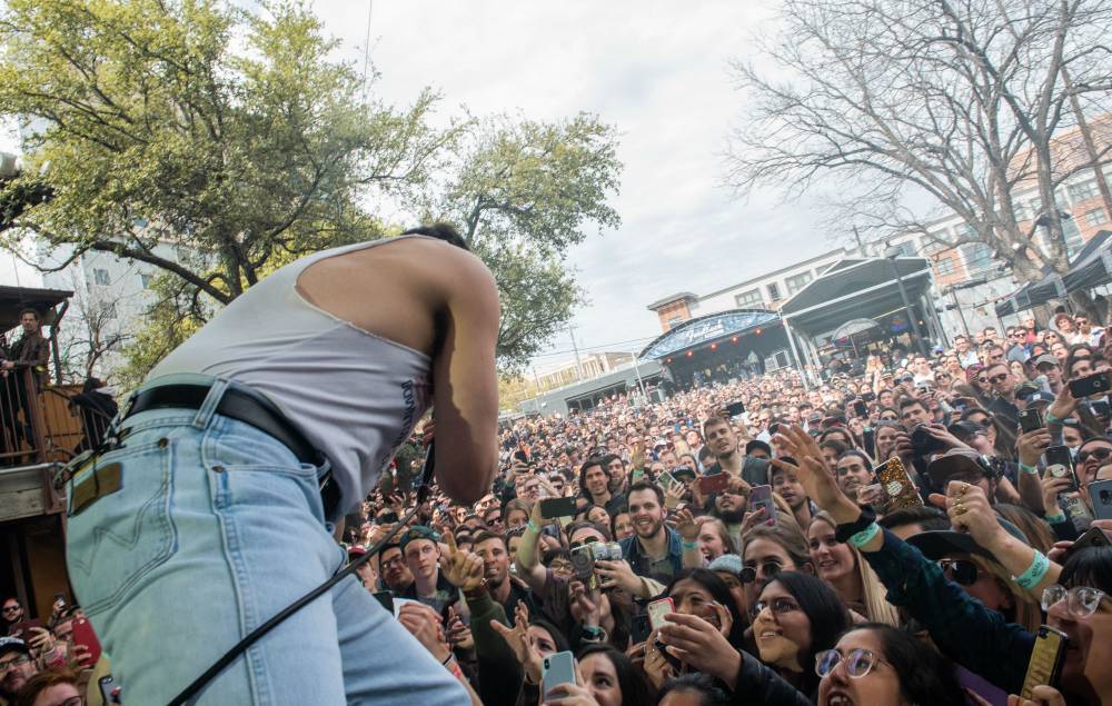 SXSW sued over lack of ticket refunds for cancelled 2020 festival - www.nme.com - USA