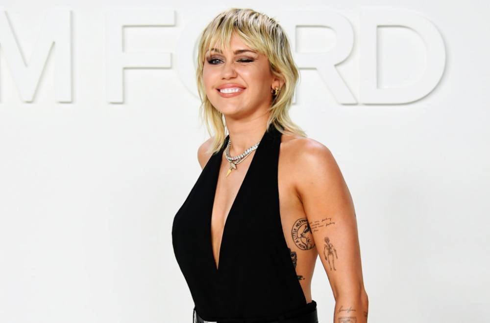 Miley Cyrus Gives Cody Simpson a Buzz Cut While Social Distancing - www.billboard.com