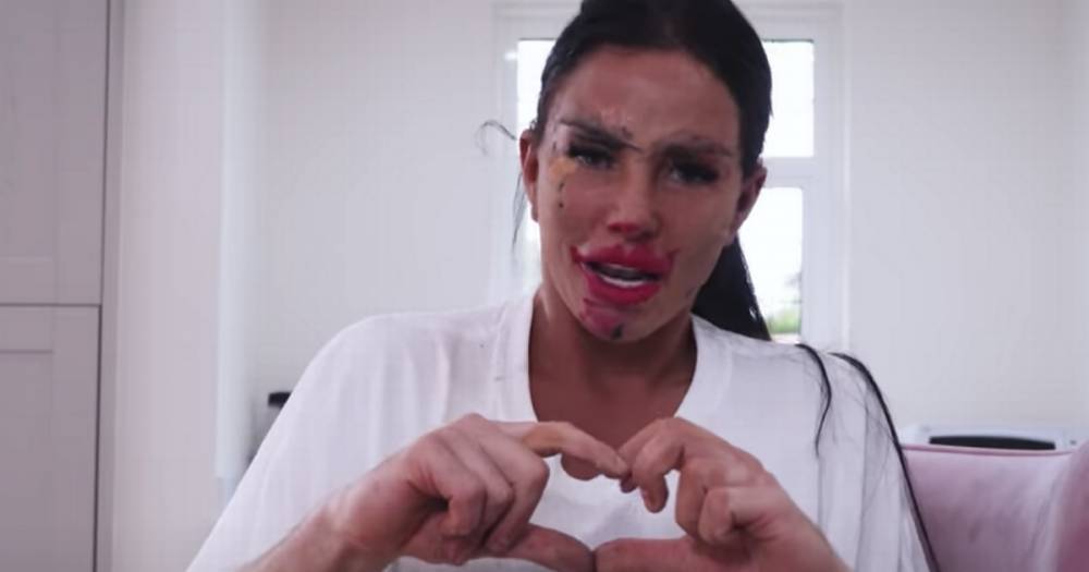 Katie Price suffers hilarious make up fail as she allows Dreamboys hunk to paint her face on camera - www.ok.co.uk
