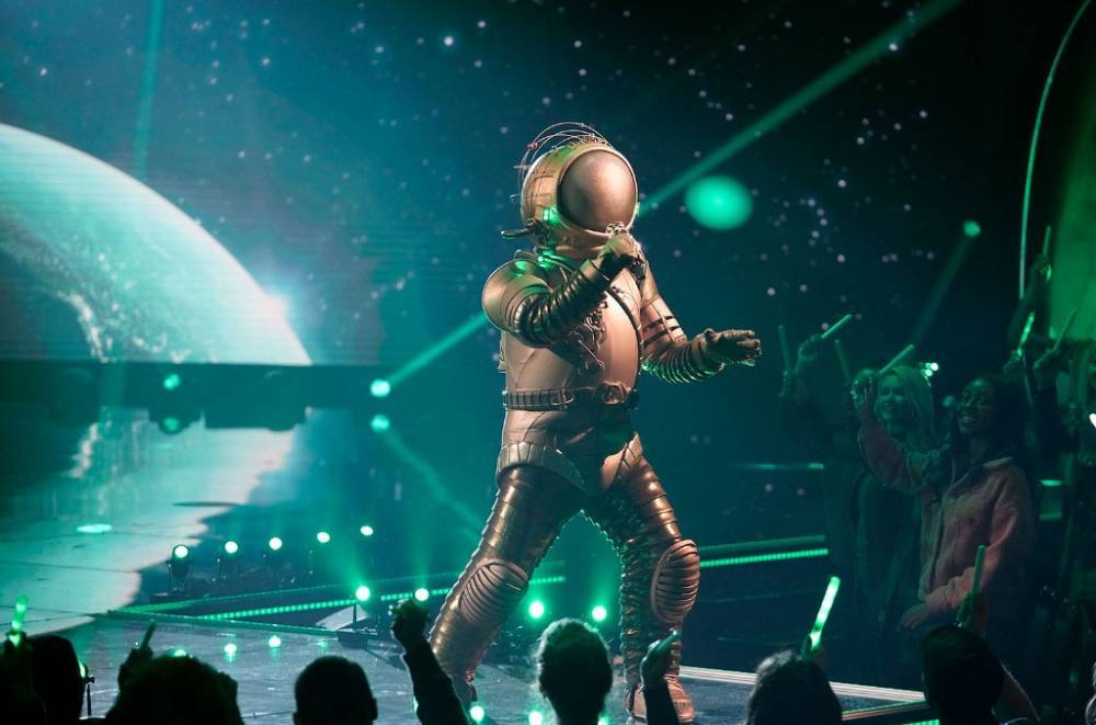 ‘The Masked Singer’ Recap: Astronaut Marooned in Space During Battle of the Sixes - www.billboard.com
