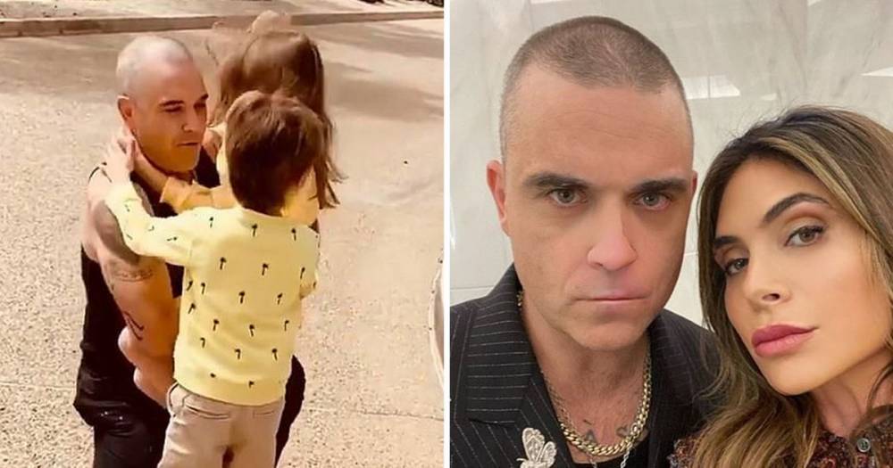 Robbie Williams reveals he isolated from his family after suffering coronavirus symptoms: 'I got down on my knees and prayed' - www.ok.co.uk