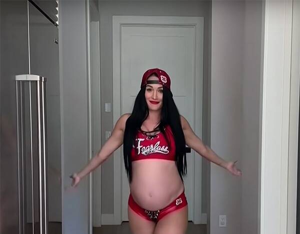 Pregnant Nikki Bella Showcases Baby Bump as She Recreates Her WWE Entrance - www.eonline.com
