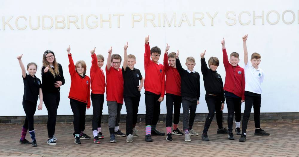Kirkcudbright Primary pupils wear odd socks for Down's Syndrome Scotland - www.dailyrecord.co.uk - Scotland