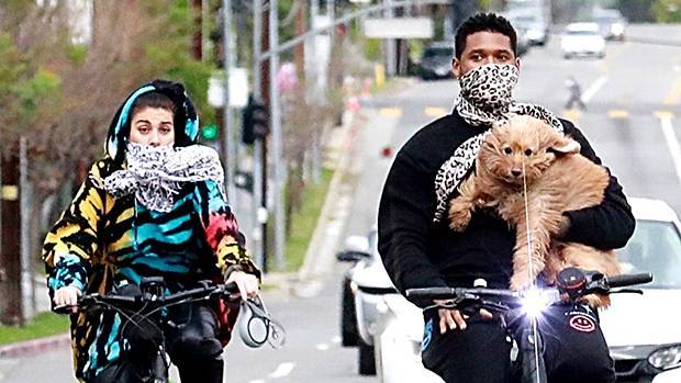 Usher Cradles His Dog In His Arms On Bike Ride With His GF — See Pics - hollywoodlife.com