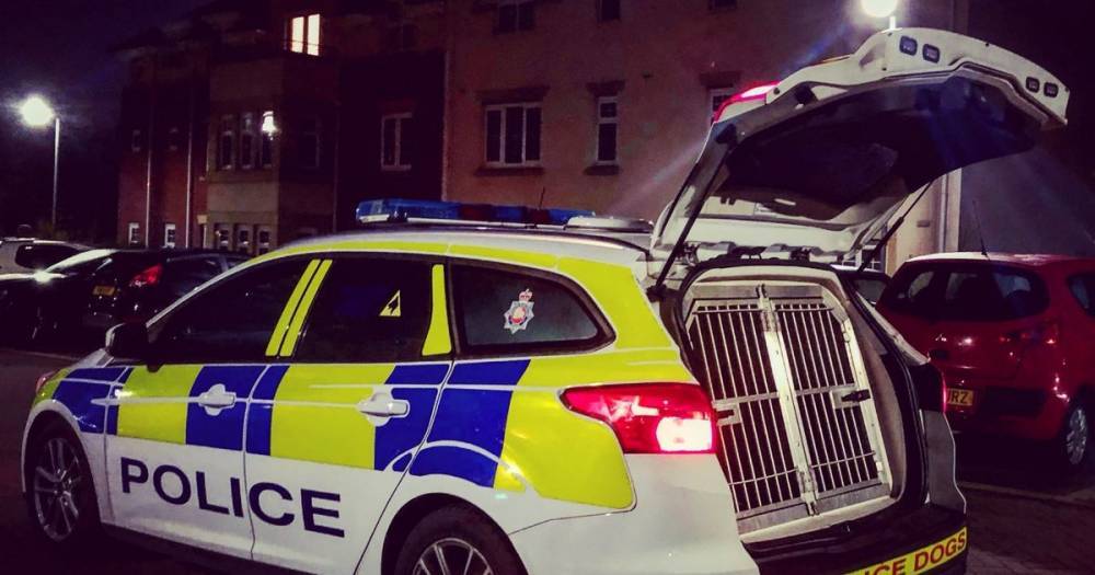 Police charge two men after a number of car doors are tried in Bolton - www.manchestereveningnews.co.uk