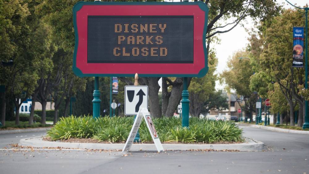 Disney Stock Downgraded Over Dim Theme Parks Forecast - www.hollywoodreporter.com - county Wells