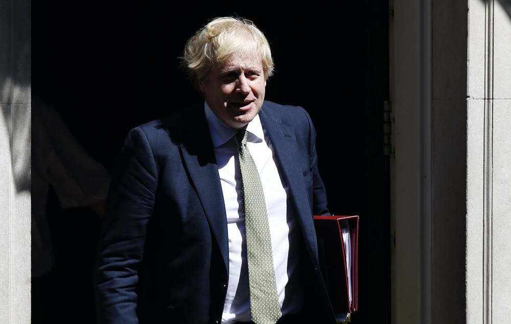 Boris Johnson announces new COVID Alert system and gives update on lockdown restrictions - www.nme.com - Britain