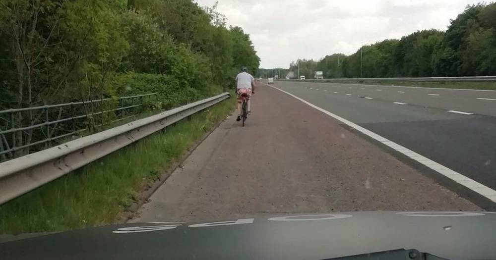 Man 'using his daily exercise to cycle on the motorway' causes two cars to crash - www.manchestereveningnews.co.uk