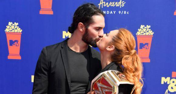 WWE: Becky Lynch REVEALS Seth Rollins' reaction to pregnancy: He threw his hands up in the air all excited - www.pinkvilla.com