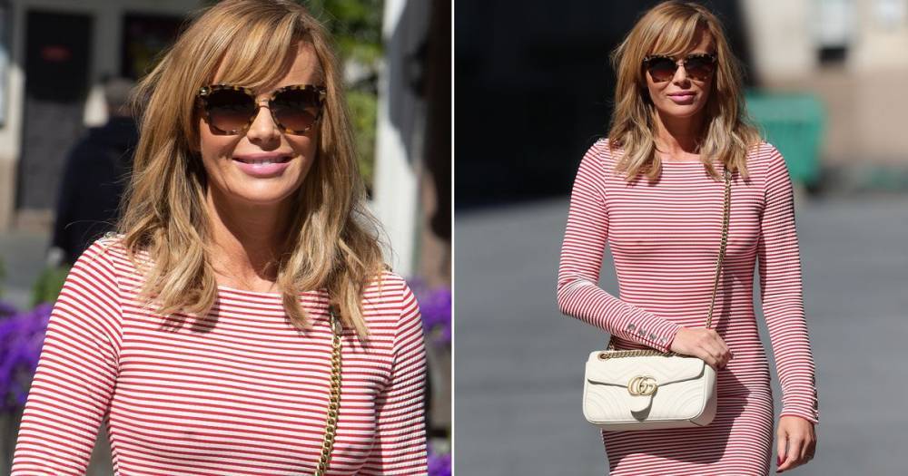 Amanda Holden looks ready for summer as she shows off bronzed legs in skintight dress - www.ok.co.uk - Britain - London