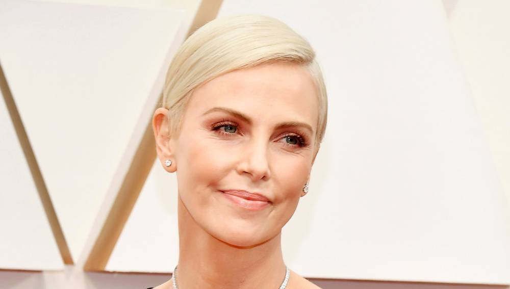 Charlize Theron Shares Rare Photo with Daughter Jackson on 'Mad Max' Set - www.justjared.com