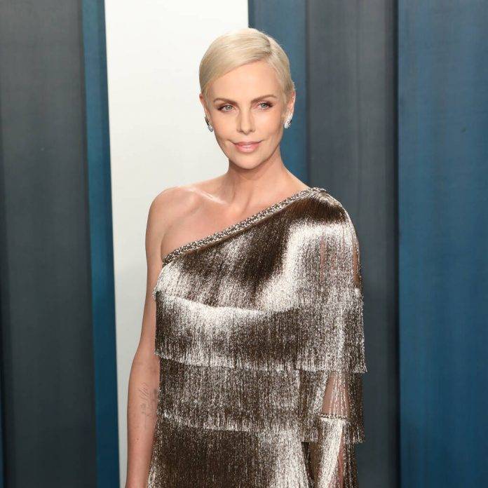 Charlize Theron remembers early motherhood on Mad Max: Fury Road set - www.peoplemagazine.co.za - Namibia - Indiana
