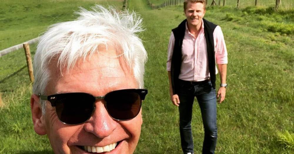 Phillip Schofield addresses boyfriend claims after fans go wild for reunion snap - www.dailyrecord.co.uk