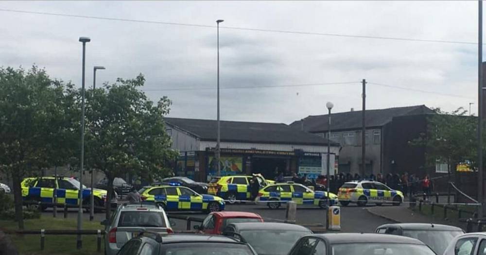 Armed police scrambled to Blackburn after woman was seriously hurt in a shooting near Lidl - www.manchestereveningnews.co.uk