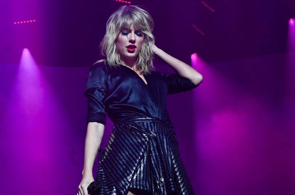 Taylor Swift Shows Off Pink & Blue Hair in Sunny Snapshots Ahead of 'City of Lover' Concert Special - www.billboard.com