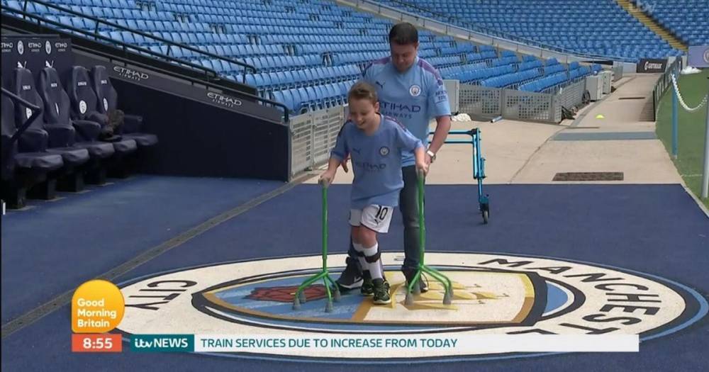 Piers Morgan cheers as young Man City fan with cerebral palsy completes Captain Tom-inspired walk - www.manchestereveningnews.co.uk - Britain