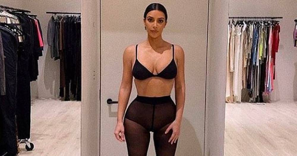 Kim Kardashian shows off hourglass figure as she models in revealing underwear - www.ok.co.uk