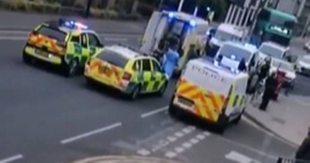 Man in hospital after stabbing outside newsagents as police descend on scene - www.manchestereveningnews.co.uk