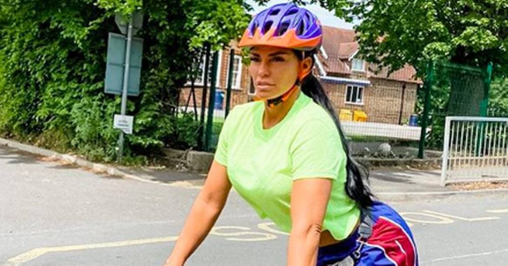 Katie Price vows to keep fit as she stuns in sportswear during bike ride with her children - www.ok.co.uk