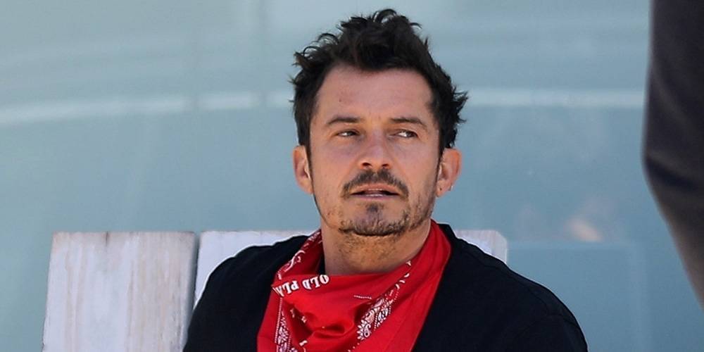 Orlando Bloom Hangs Out With Son Flynn While Running Errands in LA - www.justjared.com