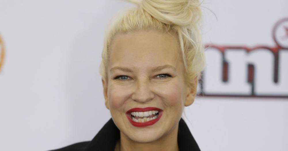 Sia Reveals She Adopted 2 Teenage Boys Who Were Aging Out of Foster Care: ‘I Love Them’ - www.usmagazine.com - Australia