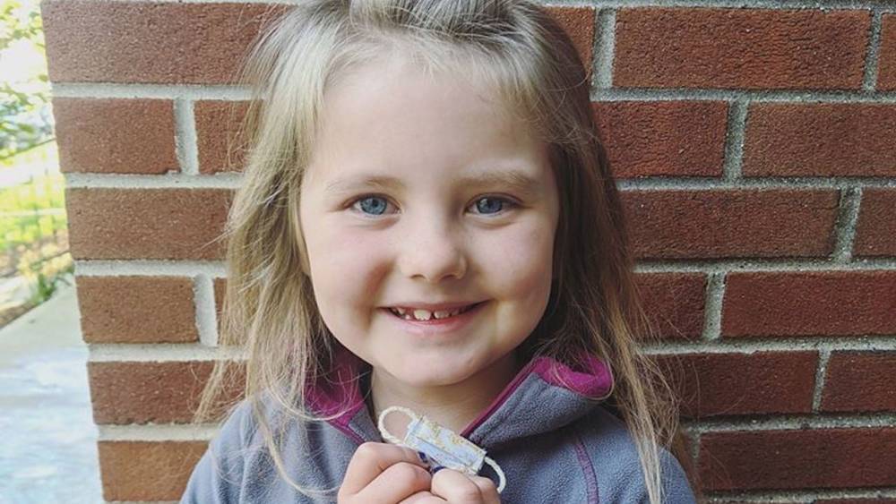 7-Year-Old Girl Loses Tooth in Quarantine, Asks Mom to Make a Mask for Tooth Fairy - www.etonline.com - Michigan