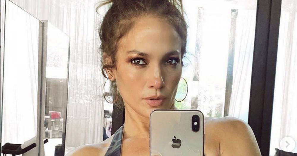 Jennifer Lopez fans freak out as they spot a ‘man in a mask’ in the background of her gym selfie - www.ok.co.uk