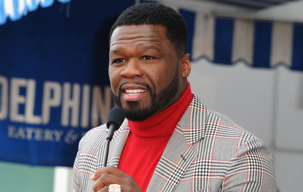 Street artist responsible for viral 50 Cent murals says he was attacked because of them - www.nme.com