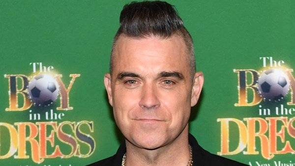 Robbie Williams reveals his father has been diagnosed with Parkinson’s disease - www.breakingnews.ie - Britain - Los Angeles