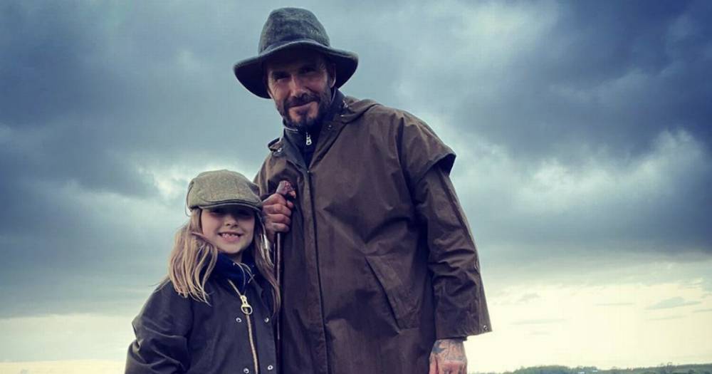 David Beckham takes Harper out for a rainy walk as stylish youngster is decked out in £60 wellies - www.ok.co.uk