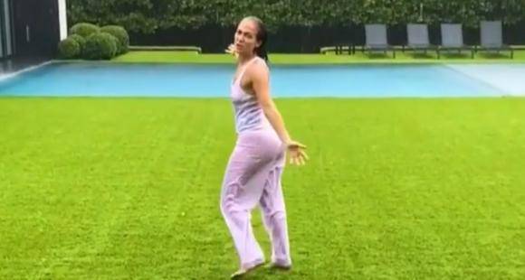 Jennifer Lopez gets goofy and dances in the rain and jumps into swimming a pool amidst lockdown; Watch video - www.pinkvilla.com