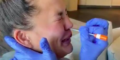 Chrissy Teigen Responded After She Was Criticized for Sharing a Video of Her Coronavirus Test - www.marieclaire.com