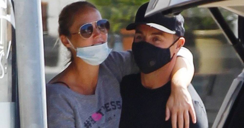 Ant McPartlin and girlfriend Anne-Marie Corbett look loved-up as they wear masks on day out - www.ok.co.uk - Britain