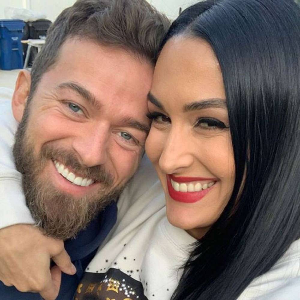 Why Nikki Bella Gave Artem Chigvintsev an "Out" at the Start of Their Romance - www.eonline.com