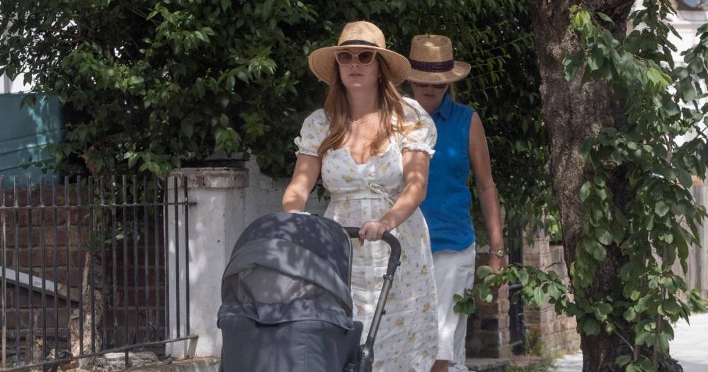 Millie Mackintosh stuns as she walks newborn daughter in pram while sporting 'S' necklace in possible nod to her name - www.ok.co.uk - London - Taylor - Chelsea