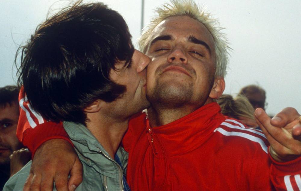 Liam Gallagher offers Robbie Williams olive branch after previous feuds - www.nme.com