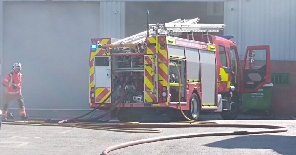 Blaze at waste management company causes clouds of smoke in Bolton - www.manchestereveningnews.co.uk - Manchester